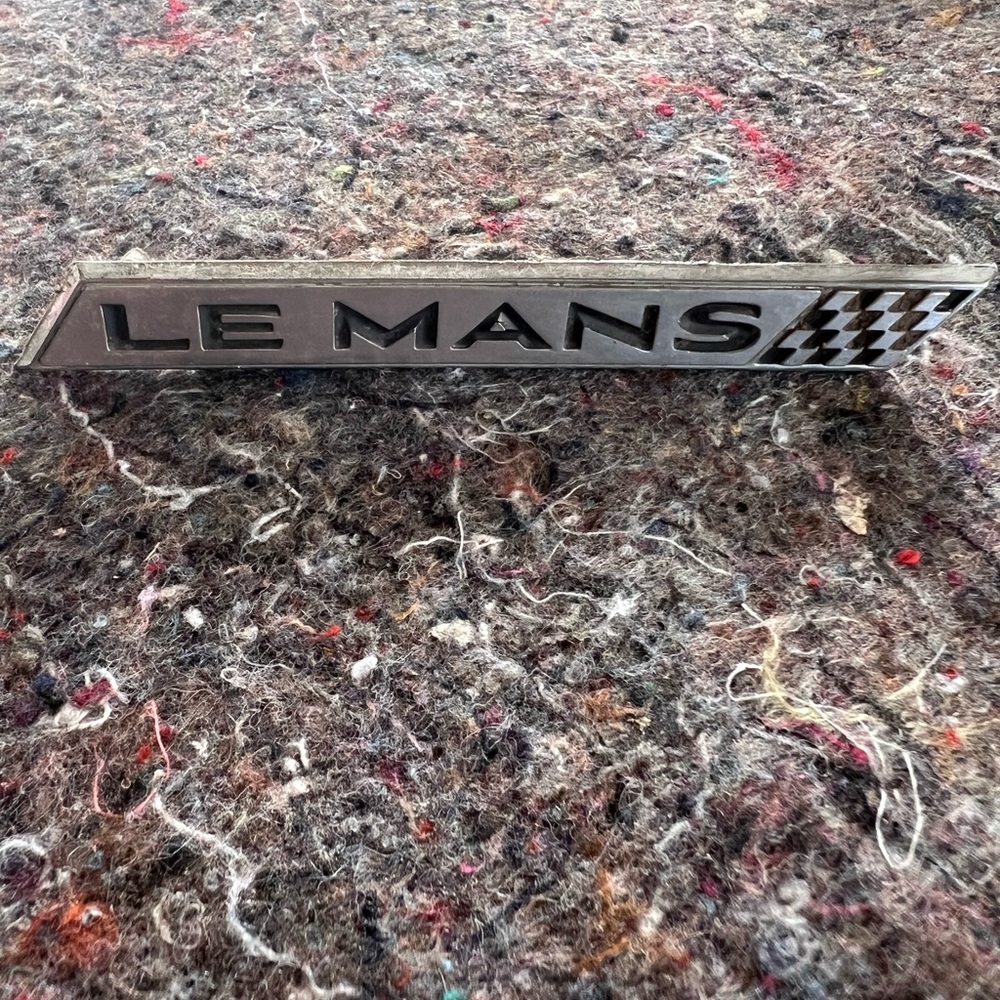 VTG 1965 LeMans Front Door Panel Chrome Emblem #4434840 4.5”